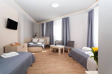 Фото номера Четырехместный номер Апарт-отели Apartamenty Platinia г. Краков 4