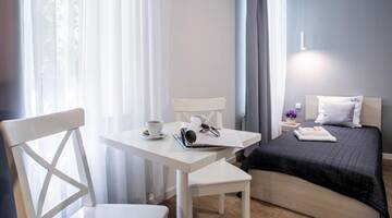 Фото номера Двухместный номер с 1 кроватью Апарт-отели Apartamenty Platinia г. Краков 22