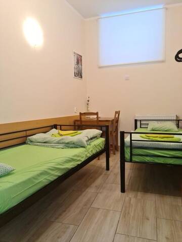Фото номера Двухместный номер с 2 отдельными кроватями Хостелы Amber Hostel г. Краков 19