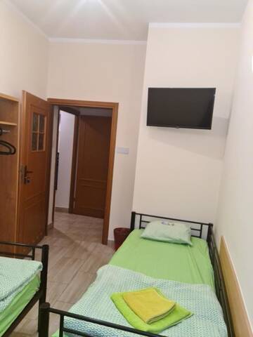Фото номера Двухместный номер с 2 отдельными кроватями Хостелы Amber Hostel г. Краков 18