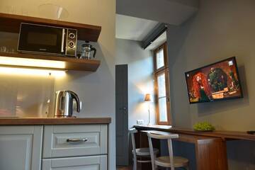 Фото номера Апартаменты с 1 спальней Апартаменты La Gioia Grey Stylish Apartments г. Краков 19