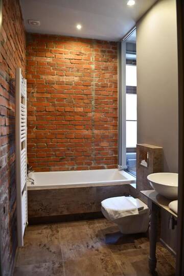 Фото номера Апартаменты с 2 спальнями Апартаменты La Gioia Grey Stylish Apartments г. Краков 13