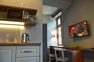 Фото номера Апартаменты с 1 спальней Апартаменты La Gioia Grey Stylish Apartments г. Краков 5