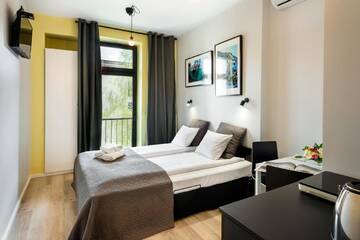 Фото номера Апартаменты с балконом Апарт-отели Krakow B&amp;B г. Краков 3