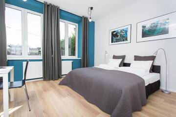 Фото номера Стандартный трехместный номер Апарт-отели Krakow B&amp;B г. Краков 4