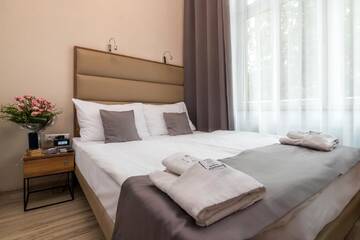 Фото номера Двухместный номер с 1 кроватью Апарт-отели Pergamin Royal Apartments г. Краков 5