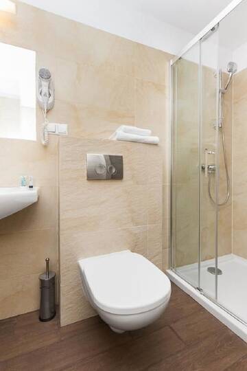 Фото номера Двухместный номер с 1 кроватью Апарт-отели Pergamin Royal Apartments г. Краков 27