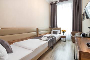 Фото номера Двухместный номер с 2 отдельными кроватями Апарт-отели Pergamin Royal Apartments г. Краков 8