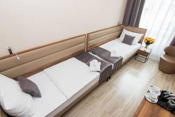 Фото номера Двухместный номер с 2 отдельными кроватями Апарт-отели Pergamin Royal Apartments г. Краков 7