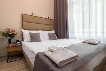 Фото номера Двухместный номер с 1 кроватью Апарт-отели Pergamin Royal Apartments г. Краков 20