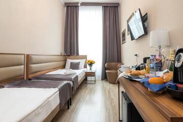 Фото номера Двухместный номер с 2 отдельными кроватями Апарт-отели Pergamin Royal Apartments г. Краков 4