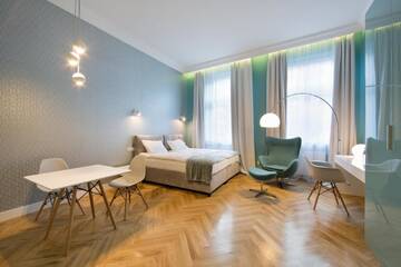Фото номера Номер-студио с кроватью размера &quot;king-size&quot; Апартаменты Apartamenty Pod Orłem г. Краков 4