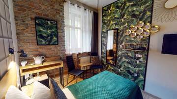 Фото номера Стандартный двухместный номер с 1 кроватью Апарт-отели Art &amp; Garden Residence г. Краков 2