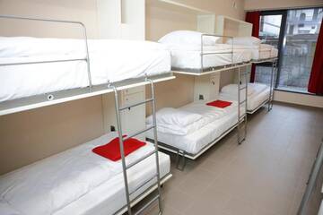 Фото номера Односпальная кровать в общем номере с 6 кроватями Хостелы City Express Hostel г. Краков 7