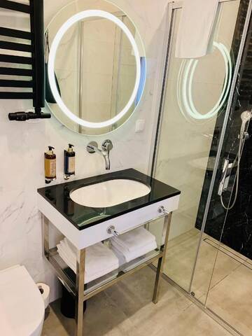 Фото номера Двухместный номер Делюкс с 1 кроватью Апарт-отели SZEWSKA 22 BOUTIQUE г. Краков 6
