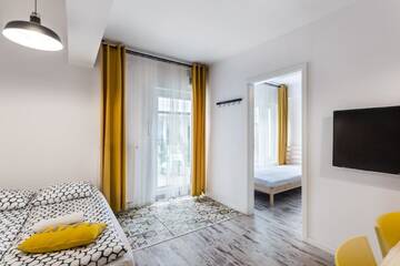 Фото номера Апартаменты с патио - 1 этаж Апартаменты Melissa Apartments г. Краков 7