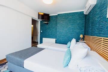 Фото номера Апартаменты с 3 спальнями Апартаменты Kings City - Zyblikiewicza Apartment г. Краков 50