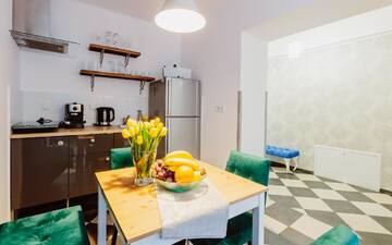 Фото номера Апартаменты с 3 спальнями Апартаменты Kings City - Zyblikiewicza Apartment г. Краков 14