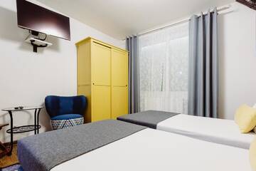 Фото номера Апартаменты с 3 спальнями Апартаменты Kings City - Zyblikiewicza Apartment г. Краков 10