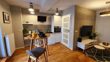 Фото номера Апартаменты с террасой Апартаменты Luxurious Apartments Gertrudy г. Краков 4