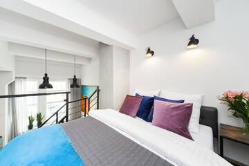 Фото номера Люкс в мансарде Апартаменты Lofts Cracow Apartments - City Center г. Краков 8
