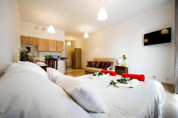 Фото номера Апартаменты с балконом Апартаменты Apartament Polonijna г. Краков 34