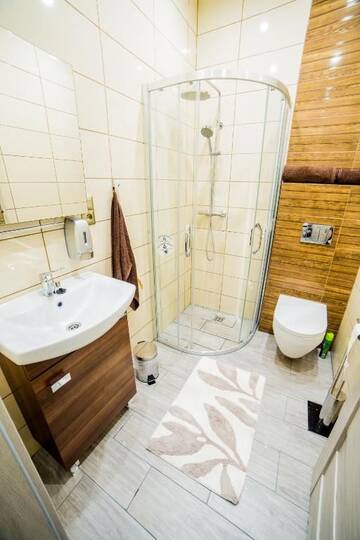 Фото номера Апартаменты с 3 спальнями и видом на город Апартаменты Market Square Residence г. Краков 42