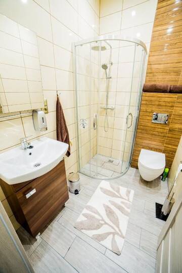 Фото номера Апартаменты с 3 спальнями и видом на город Апартаменты Market Square Residence г. Краков 26