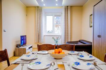 Фото номера Апартаменты с 3 спальнями и видом на город Апартаменты Market Square Residence г. Краков 7