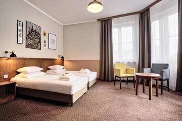 Фото номера Классический трехместный номер с видом на город Апарт-отели Daniel Griffin Aparthotel by Artery Hotels г. Краков 9