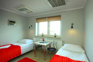 Фото номера Двухместный номер с 2 отдельными кроватями Хостелы Hostel Bazar г. Краков 7