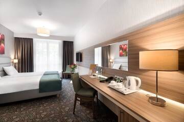 Фото номера Двухместный номер с 2 отдельными кроватями Отель Golden Tulip Krakow Kazimierz г. Краков 9