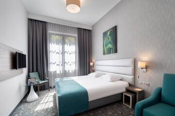 Фото номера Двухместный номер с 1 кроватью Отель Golden Tulip Krakow Kazimierz г. Краков 10
