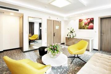 Фото номера Семейный полулюкс Отель Golden Tulip Krakow Kazimierz г. Краков 2