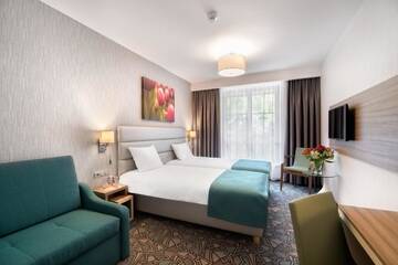 Фото номера Двухместный номер с 2 отдельными кроватями Отель Golden Tulip Krakow Kazimierz г. Краков 4