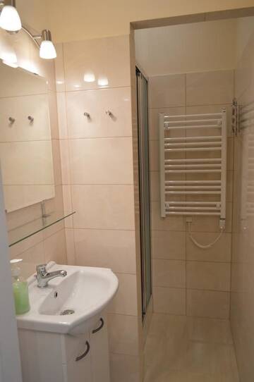 Фото номера Классический трехместный номер Апартаменты Krovo Apartments г. Краков 10