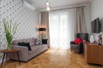 Фото номера Улучшенные апартаменты Апартаменты Luxe Living Krakow г. Краков 3