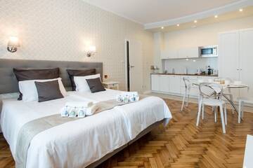 Фото номера Улучшенные апартаменты Апартаменты Luxe Living Krakow г. Краков 6