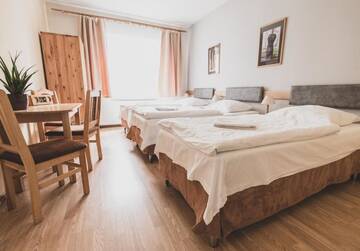 Фото номера Трехместный номер «Комфорт» Гостевой дом Cybulskiego Guest Rooms г. Краков 2