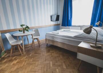 Фото номера Двухместный номер с 1 кроватью и мини-кухней Гостевой дом Cybulskiego Guest Rooms г. Краков 7