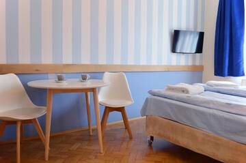 Фото номера Двухместный номер с 1 кроватью и мини-кухней Гостевой дом Cybulskiego Guest Rooms г. Краков 12