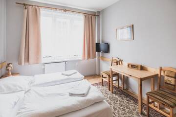 Фото номера Двухместный номер с 2 отдельными кроватями Гостевой дом Cybulskiego Guest Rooms г. Краков 2