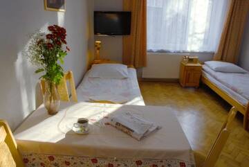 Фото номера Трехместный номер с основными удобствами Гостевой дом Cybulskiego Guest Rooms г. Краков 4