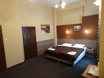 Фото номера Двухместный номер Делюкс с 1 кроватью Отель Hotel Maksymilian г. Краков 3