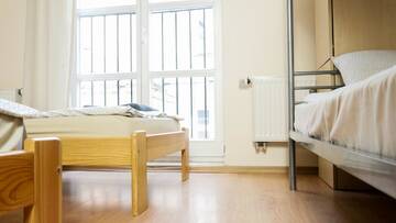 Фото номера Кровать в общем 6-местном номере Хостелы HEYnow Rooms, Apartments and hostel in CITY center г. Краков 4