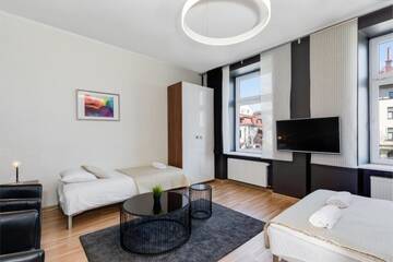 Фото номера Апартаменты с 2 спальнями (для 5 взрослых) Апартаменты Rainbow Apartments 1 г. Краков 13