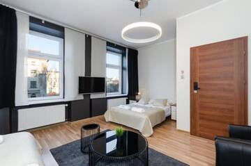 Фото номера Апартаменты с 2 спальнями (для 5 взрослых) Апартаменты Rainbow Apartments 1 г. Краков 11