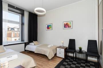 Фото номера Апартаменты с 2 спальнями (для 5 взрослых) Апартаменты Rainbow Apartments 1 г. Краков 15