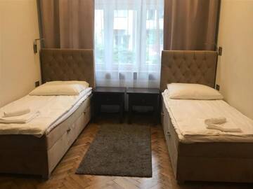 Фото номера Улучшенные апартаменты с тремя спальнями: Skwerowa 30/1 Апартаменты Apartamenty Splendor г. Краков 7