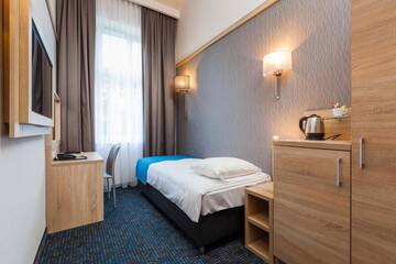 Фото номера Одноместный номер эконом-класса Отель Hotel Legend г. Краков 2